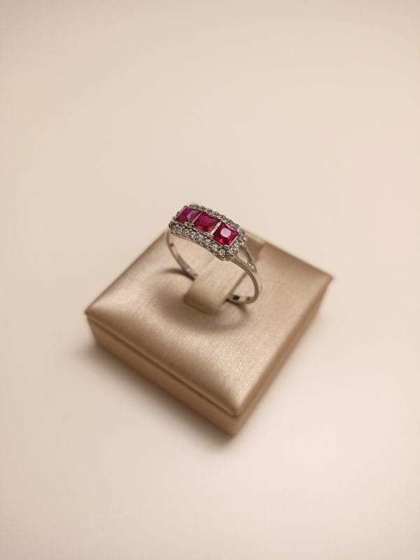 anello-trilogy-zirconi-rosso-donna-oro-18kt-gioiellerie-landolfi-ainis-pescara-montesilvano-910004267016